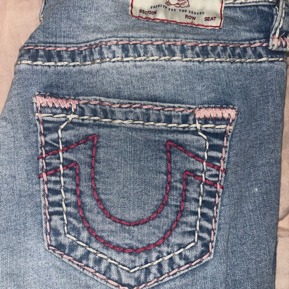 True Religion Pink and Blue Denim Jeans with Signature Stitching
